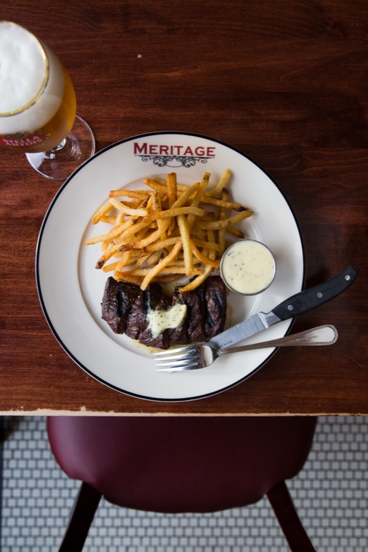 Steak frites with béarnaise and a cold beer at Meritage
